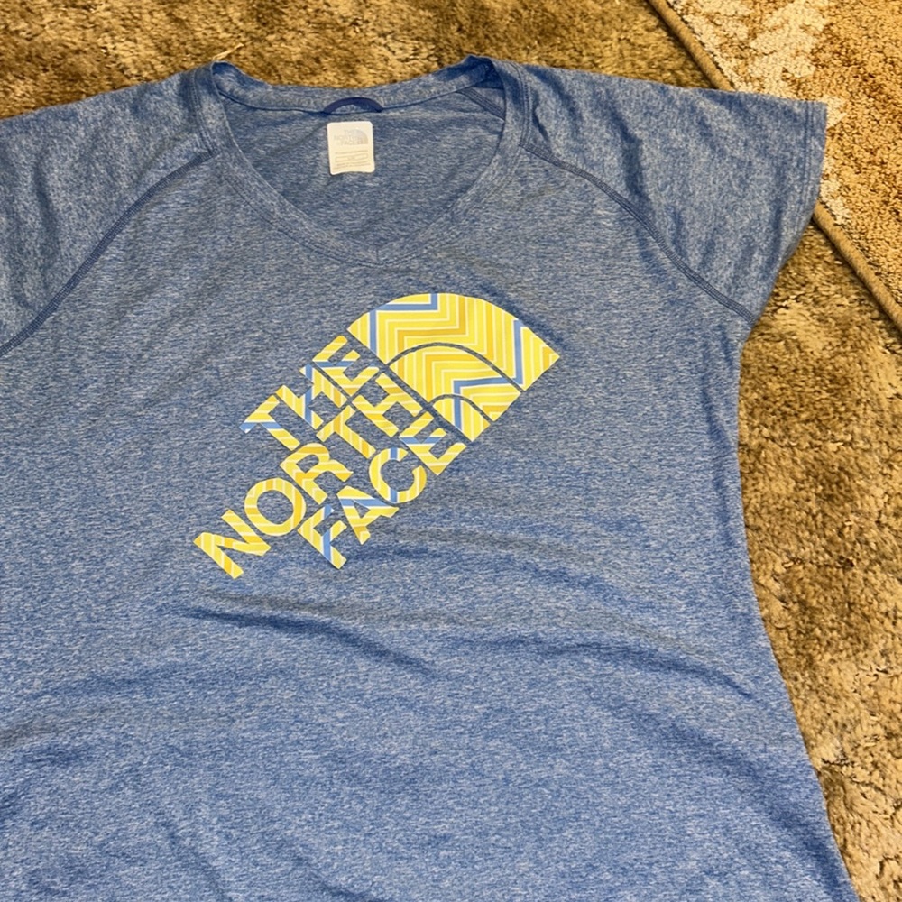 The north face tshirt size large blue and yellow